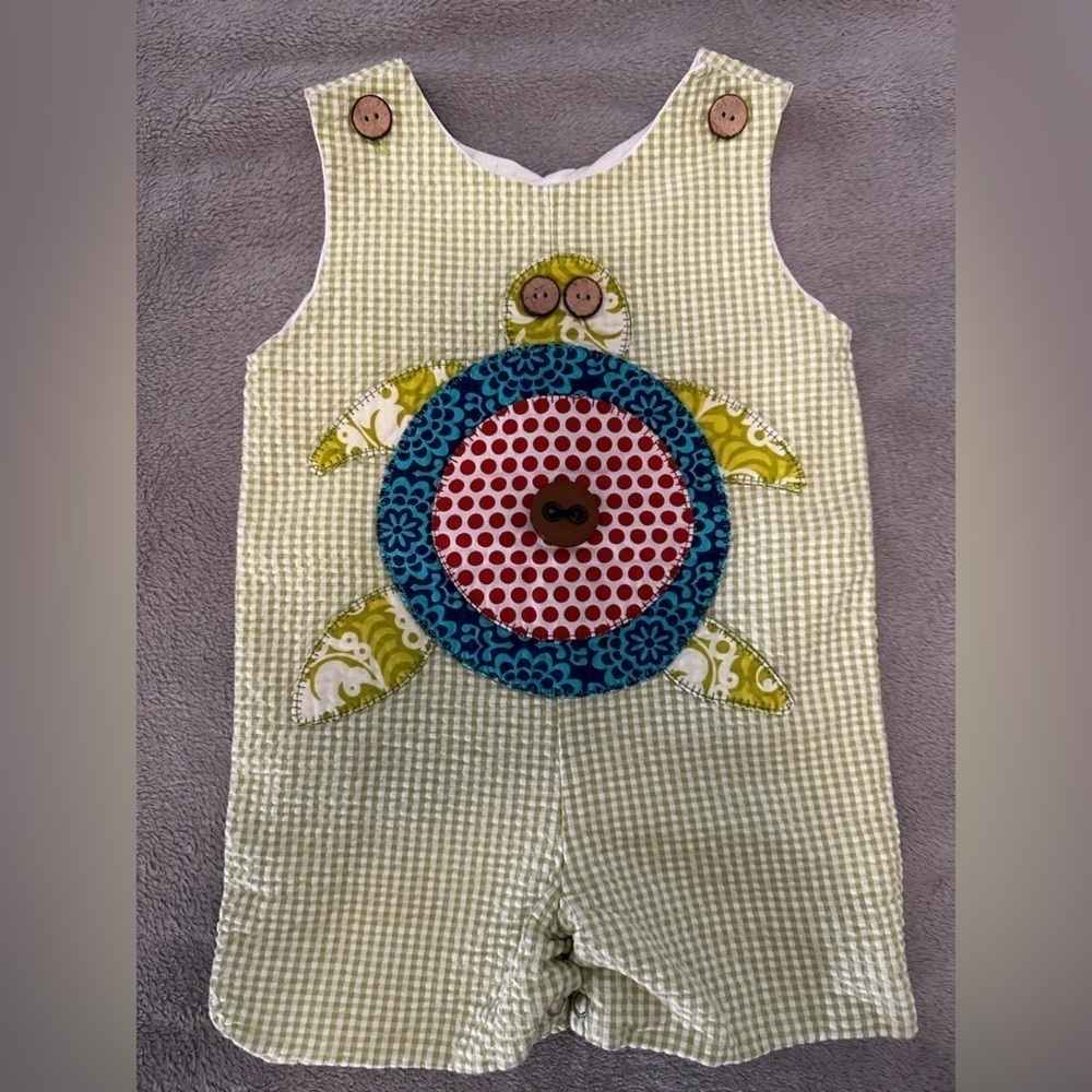 green seersucker turtle shortall sz 12 months EUC button needs to be reattached